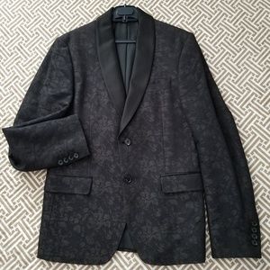 Zara's black Jacuard tuxedo jacket.